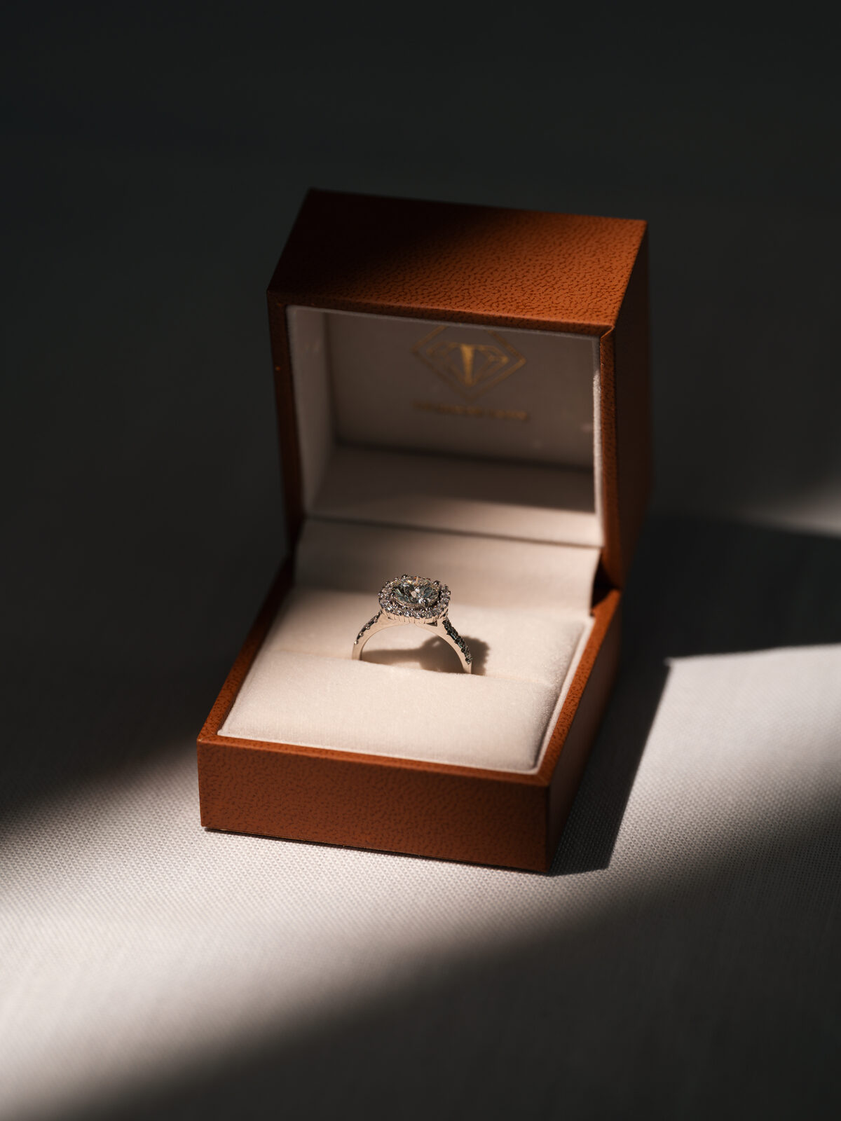 Natural diamond engagement ring in an open ring box, ready for a December proposal in Cape Town