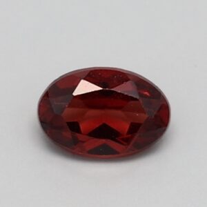 0.527ct Oval Medium dark toned orange Natural Certified Garnet